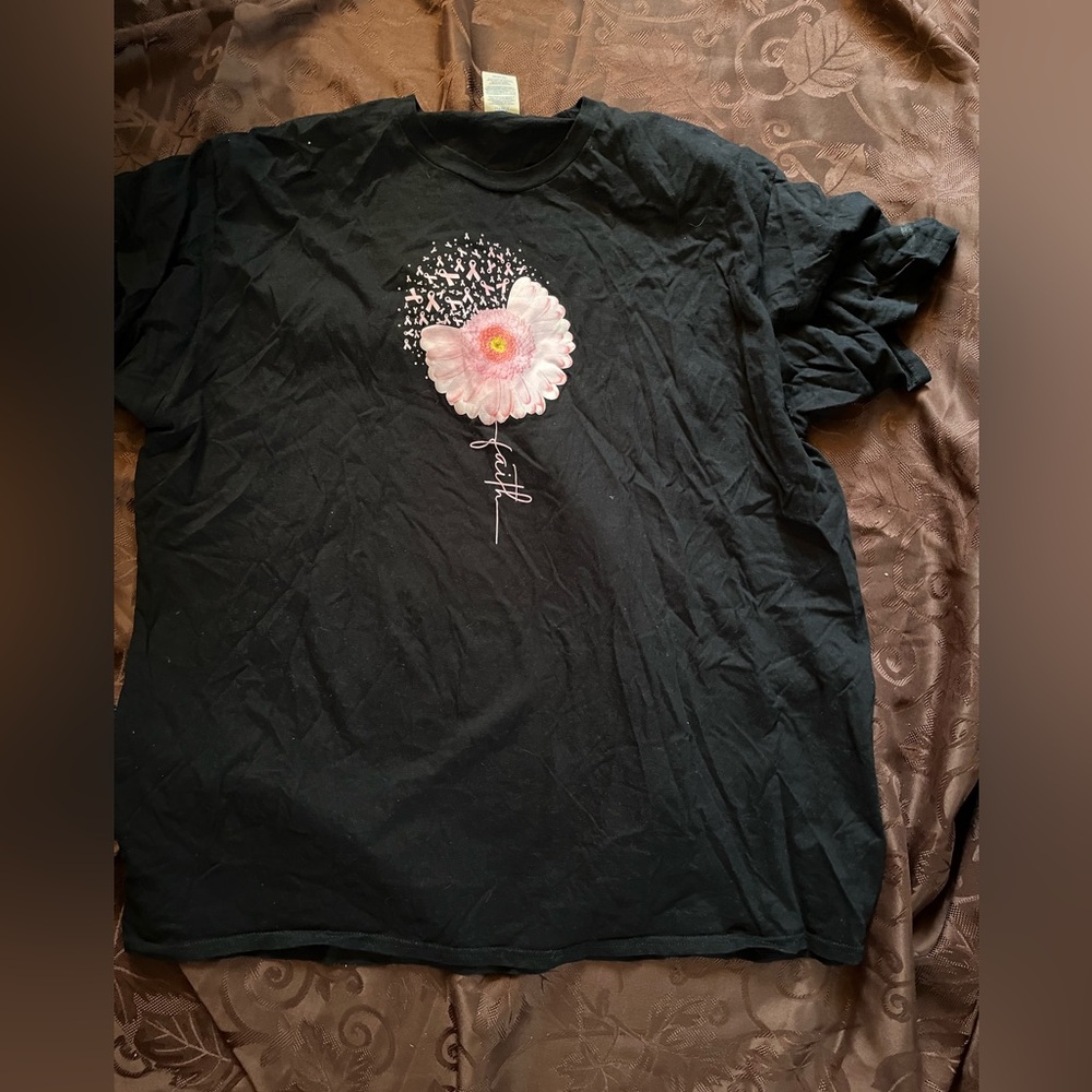 Black t-shirt with pink flower with ribbons and faith stem